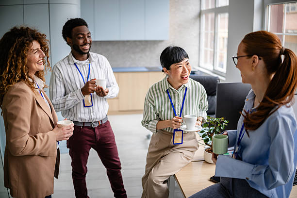 istock Cheerful team meeting in a modern office promoting collaboration and professional growth among women 2209580357