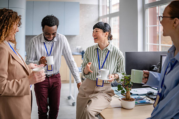 istock Modern office teamwork among diverse women sharing ideas and fostering collaboration in a cheerful meeting environment 2209582011