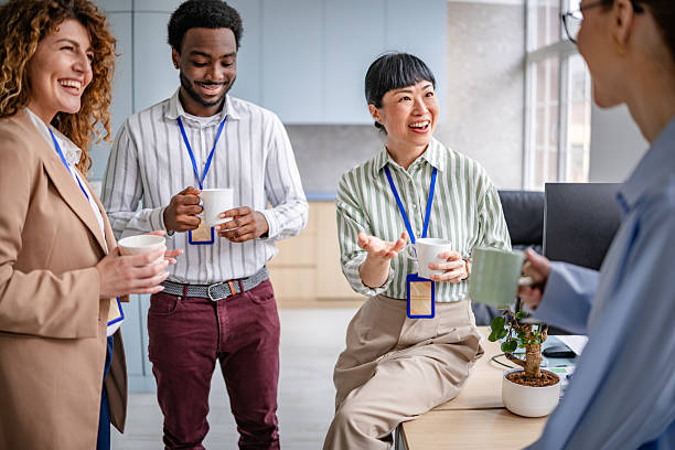 istock Team of diverse business professionals engaging in collaborative discussion in a modern office environment 2209582188
