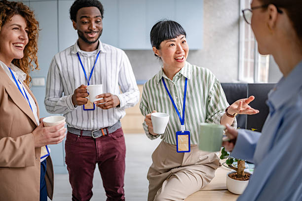 istock Engaging discussion among diverse women professionals in a modern office setting during a collaborative meeting 2209582212