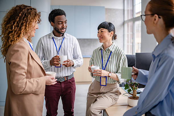 istock Team members engaging in discussion and collaboration in a modern office setting 2209582306