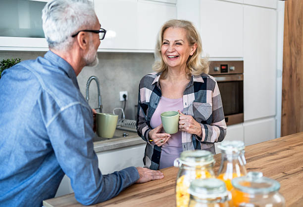 istock Senior couple drinking coffee in the morning 2209588906