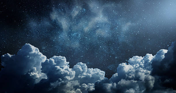 istock Starry night sky with clouds.. Panorama. Elements of this image furnished by NASA 2209589214