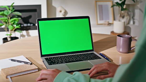 istock Online student studying chroma key laptop browsing webinar home closeup. 2209589922