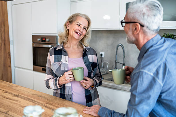 istock Senior couple drinking coffee in the morning 2209590009