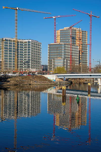 istock Construction site with cranes for new office buildings 2209590701