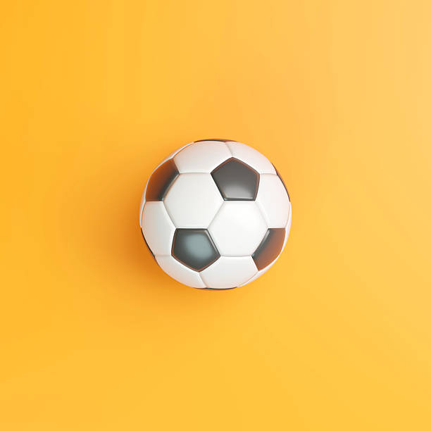 istock 3D soccer ball on vibrant orange background 2209592194