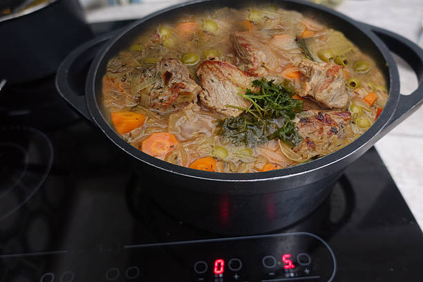 istock Veal with onions being cooked in a casserole dish 2209593543