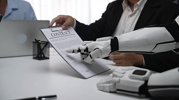 istock Robot Hand Signing Business Contract at Modern Office Meeting 2209596069
