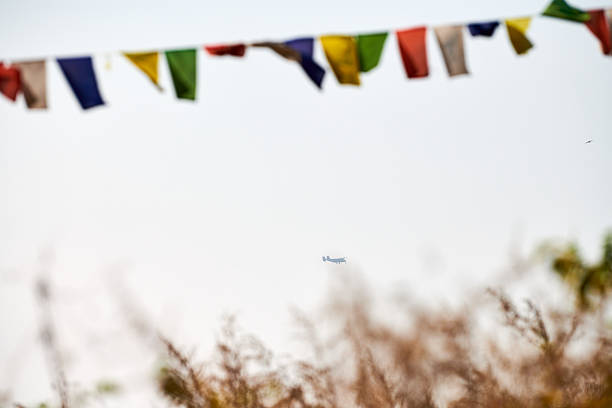 istock Colorful Tibetan prayer flags flutter ancient prayers into serene mountain wind 2209596198