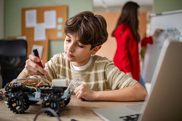 istock Kids engage in innovative robot design during after-school robotics class focused on hands-on learning and teamwork 2209596375