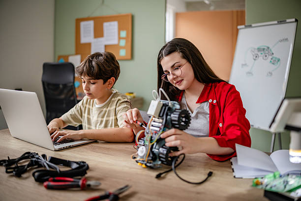 istock Students engage in innovative robot design during a robotics class focused on creativity and teamwork 2209597689
