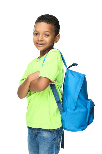 istock Young African American school boy with backpack on white background 2209598041