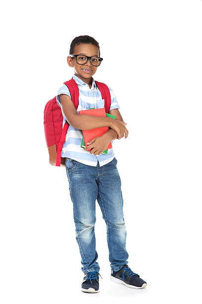 istock Young African American school boy with books and backpack on white background 2209598913