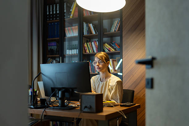 istock Woman working in home office 2209602079