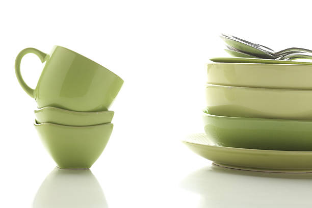 istock Beautiful multi-coloured bright ceramic bowl and tarenes on the table. Clean crockery concept 2209605959