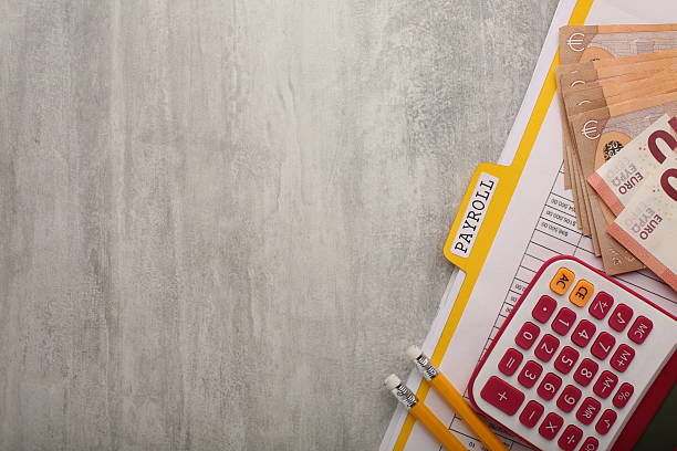 istock Payroll statement, tax deductions, and salary payment system 2209606239