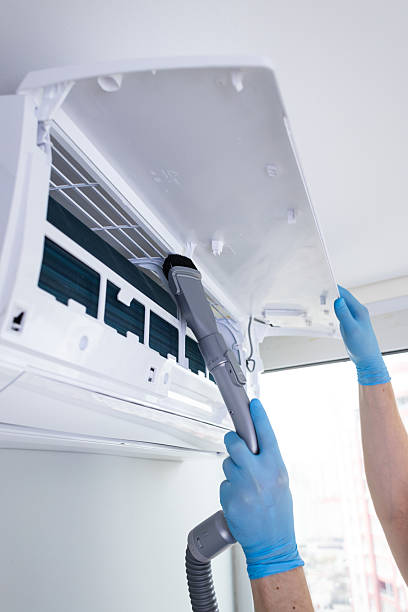 istock Efficient Air Conditioner Maintenance: Cleaning the Filter with Care for Optimal Performance and Longevity 2209610505