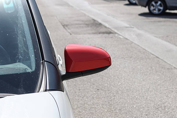 istock Folded red rear-view mirror of a car. 2209612341