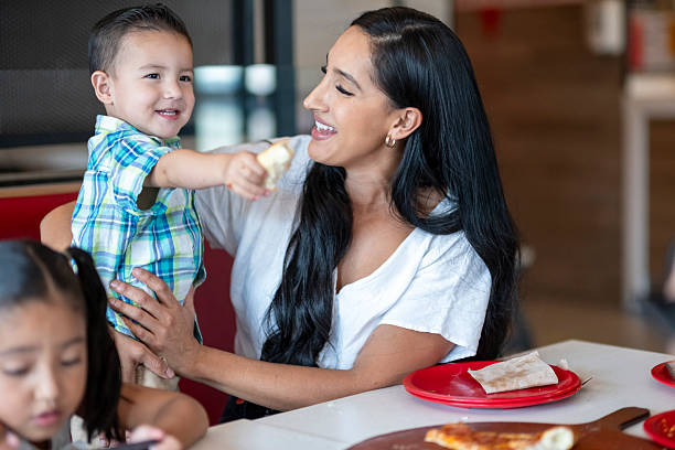 istock Mother with her children 2209614198