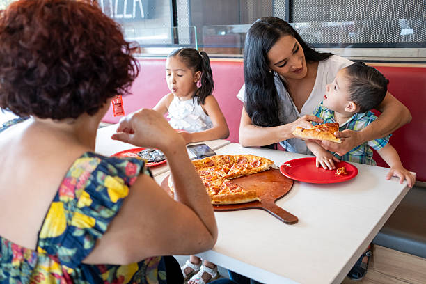 istock Family eating together 2209614536