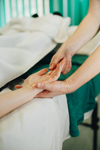 istock Hand massage at spa salon stock photo 2209619256