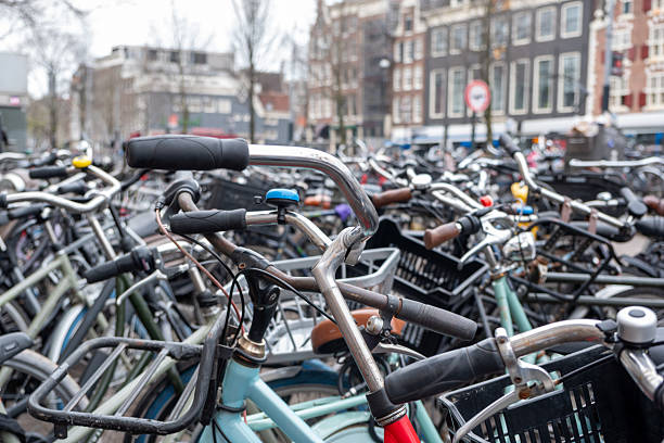 Redhead senior tourist at an Amsterdam bicycle storage location