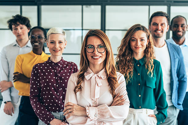 istock Confident businesswoman and her team 2209619849
