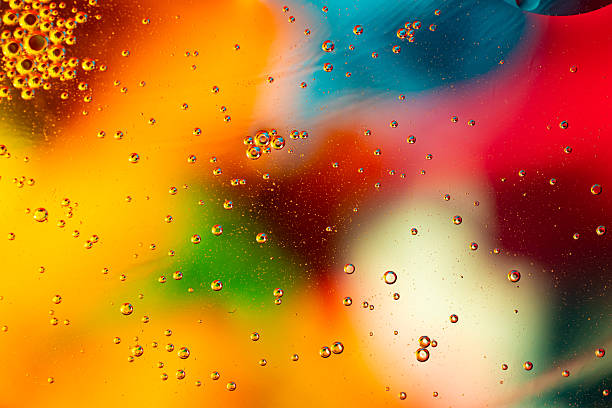 istock Oil and water, abstract background yellow and ginger color, Space for text. 2209621513