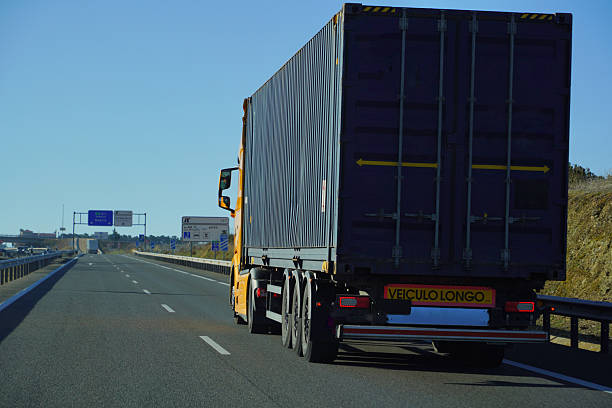istock Articulated truck for transporting maritime containers by road 2209624833