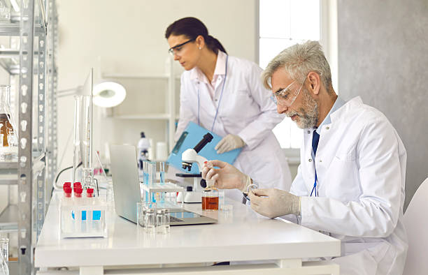 istock Medical scientists working in laboratory, doing research and using modern lab equipment 2209628653