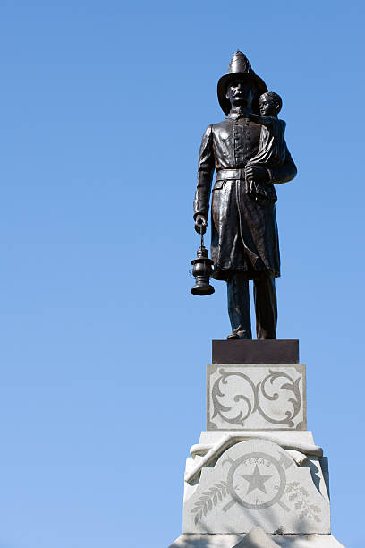 istock Monument to fireman with rescued child 2209629553