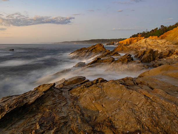 Long exposure rocky coastline at dawn