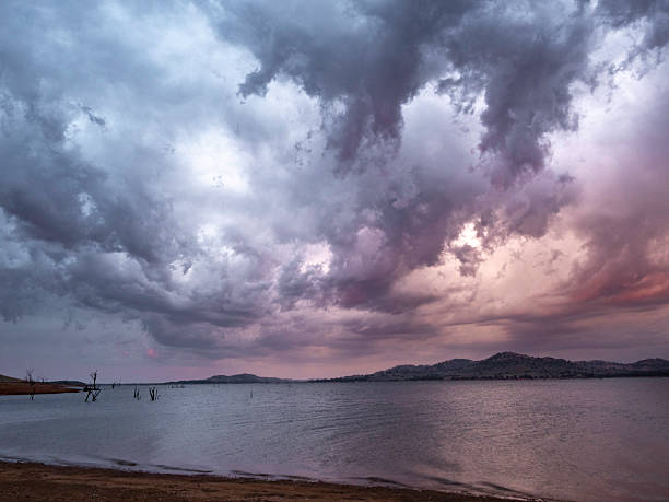 Beautiful dramatic sunset storm cloud over Lake Hume
