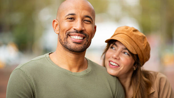 istock Close up smiling man with his partner looking at him with admiration. 2209636425