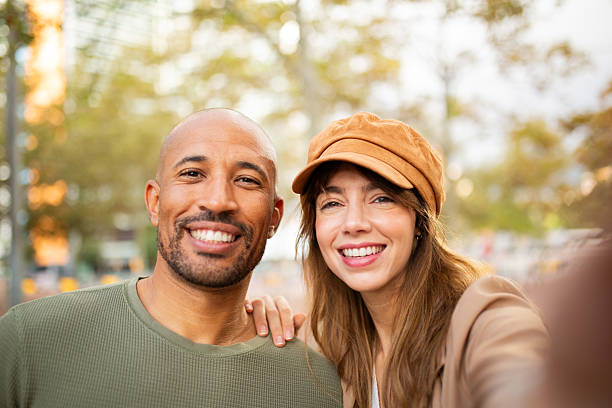 istock Selfie smiling stylish couple in love 2209636453