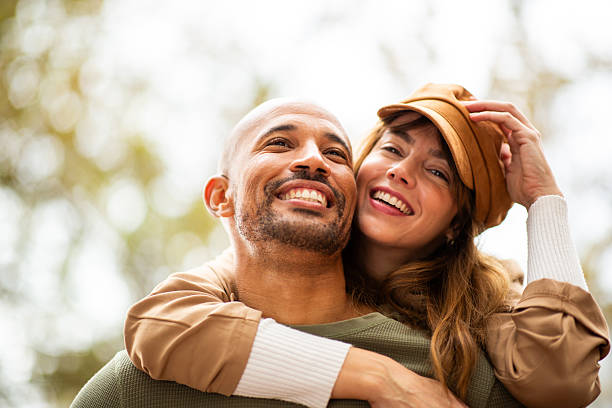 istock they hold onto each other during a fun piggyback ride 2209636476