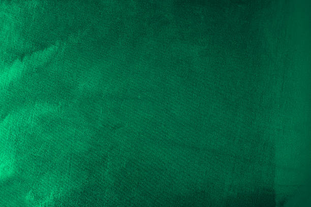 istock Black dark emerald green abstract background. Shiny silk fabric. Metallic shine. Light reflection. 2209637448