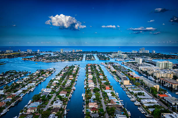 Residential district along canals in Fort Lauderdale, Florida shot via helicopter from an altitude of 1000 feet.