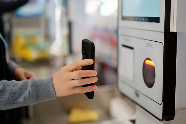 istock Modern Contactless Payment with Smartphone at Retail Checkout 2209662116