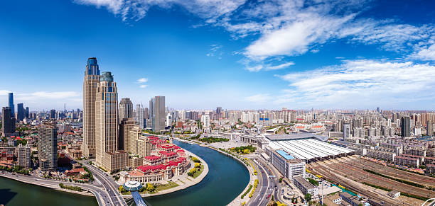 istock Vibrant Urban Cityscape with Modern Architecture and River 2209662127