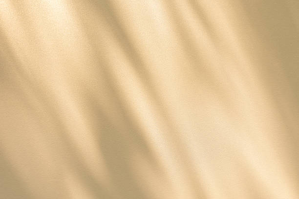 istock Studio style background wall decoration presentation uses white and beige tones. with shadows cast from a nearby window, concept creating a decorative 2209664551