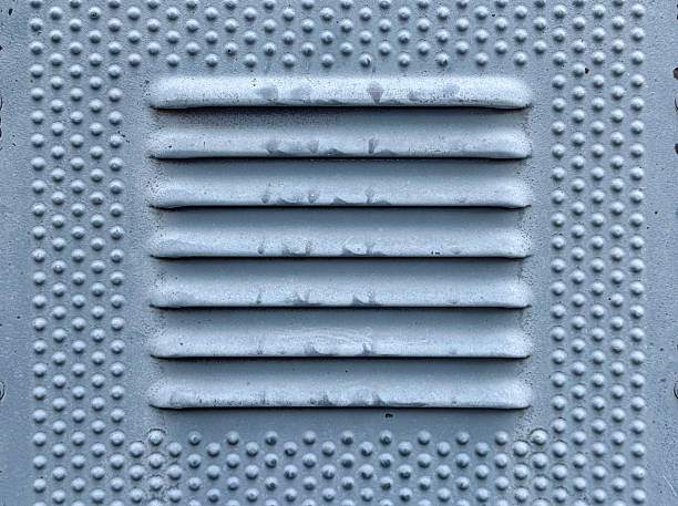 istock Metal ventilation holes with slits, textured 2209666100