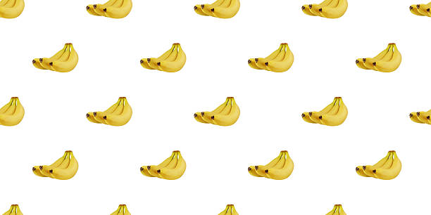 Seamless pattern of ripe yellow bananas isolated on white background