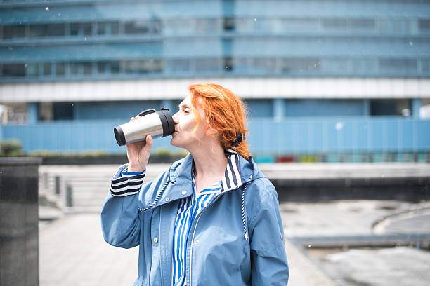istock A businesswoman having a coffee break outside 2209674448