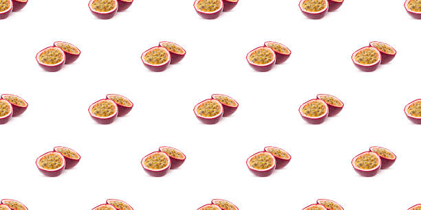 istock Seamless pattern of ripe passion fruit halves isolated on white background 2209675641