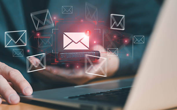 istock Business man using smartphone and computer that show warning sign after got attack phishing email by malware from hacker that commit cyber crime or software crash to cause an error 2209684504