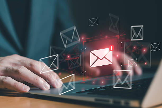 istock Business man using smartphone and computer that show warning sign after got attack phishing email by malware from hacker that commit cyber crime or software crash to cause an error 2209684516