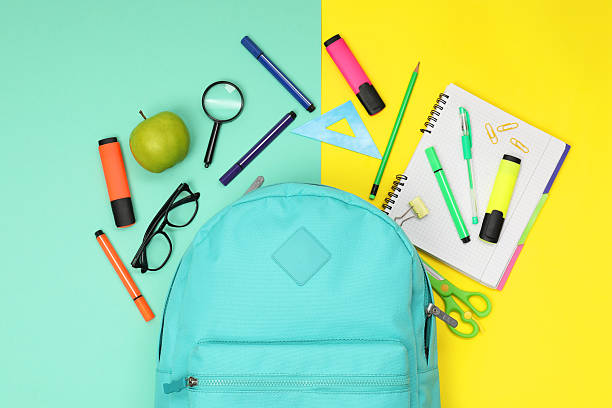istock Flat lay composition with backpack and different school stationery on color background 2209685208