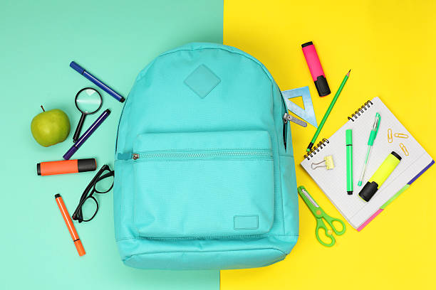 istock Flat lay composition with backpack and different school stationery on color background 2209685247